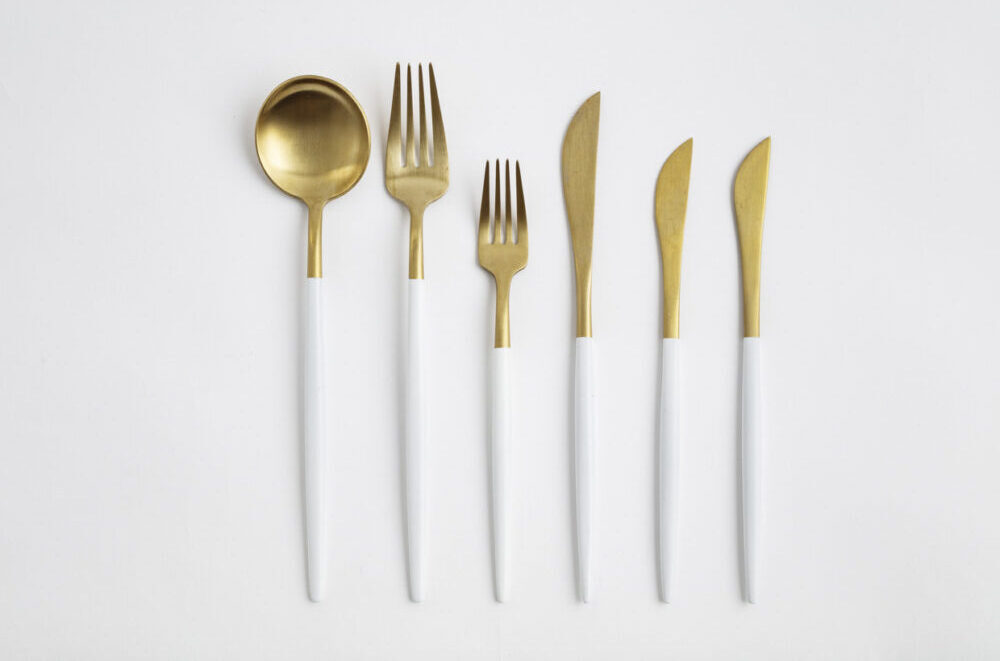 Gold and white cutlery